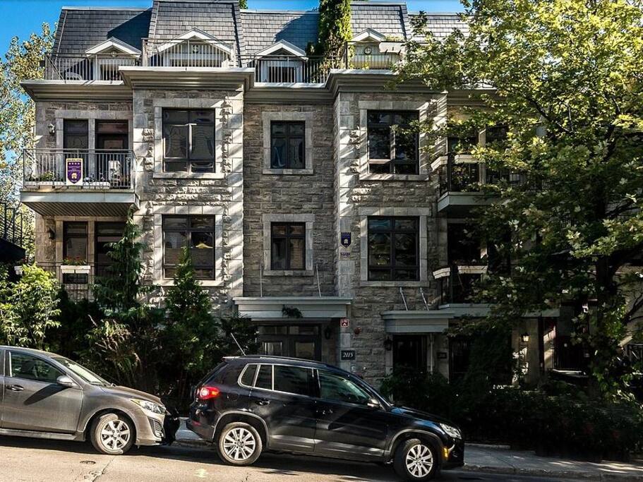 Street view of condo building. Secure, locked entrance. Condo has a security camera in the unit so you can see who is in the entrance before granting guests entrance into the building.