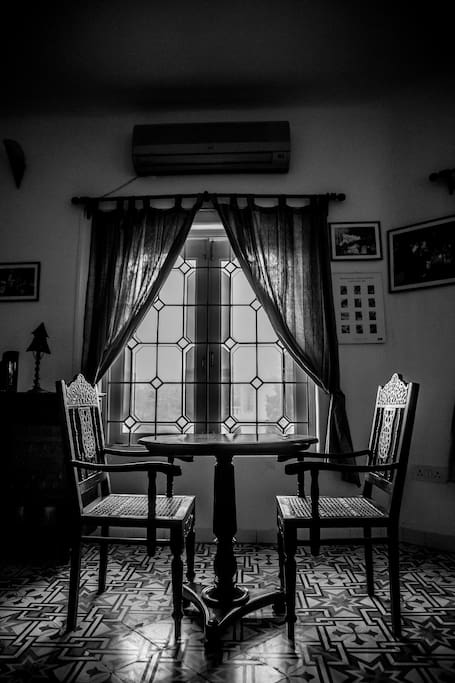 the stained glass windows and the goa chairs