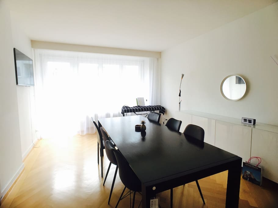 Dining room with a keyboard (piano) by the window