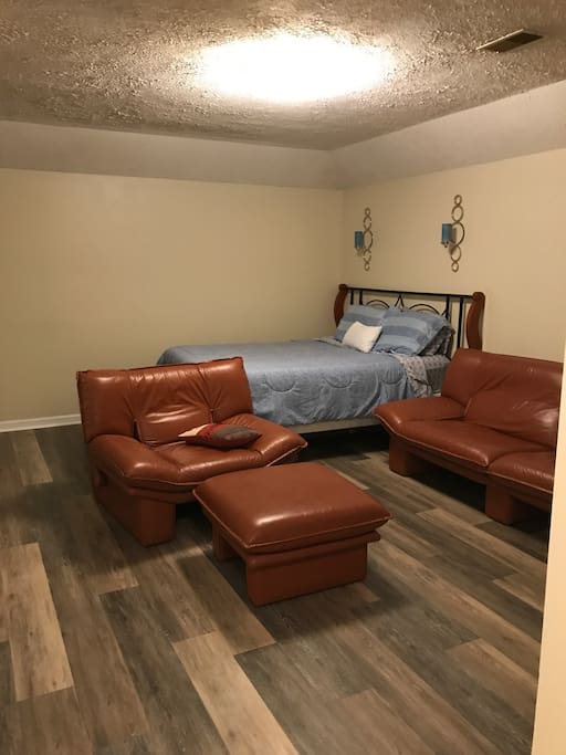 "Living Room" with couch & queen sized memory foam bed!