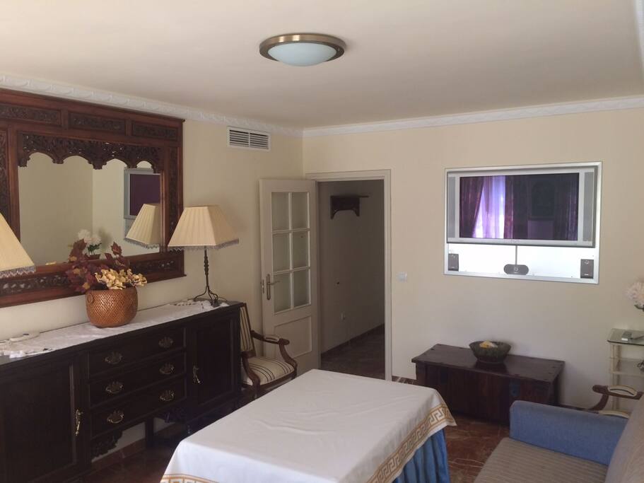 Salón con sofá cama de matrimonio