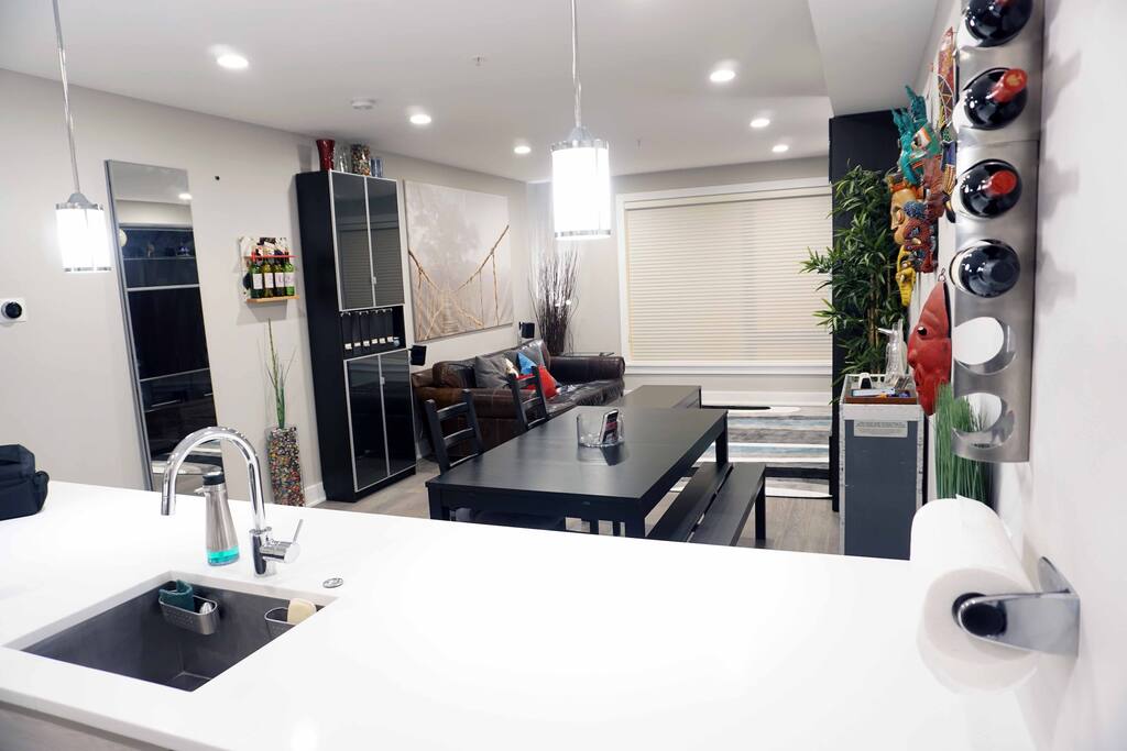 Dining room table with two additional leaves for larger group dinner, recessed lighting throughout house.