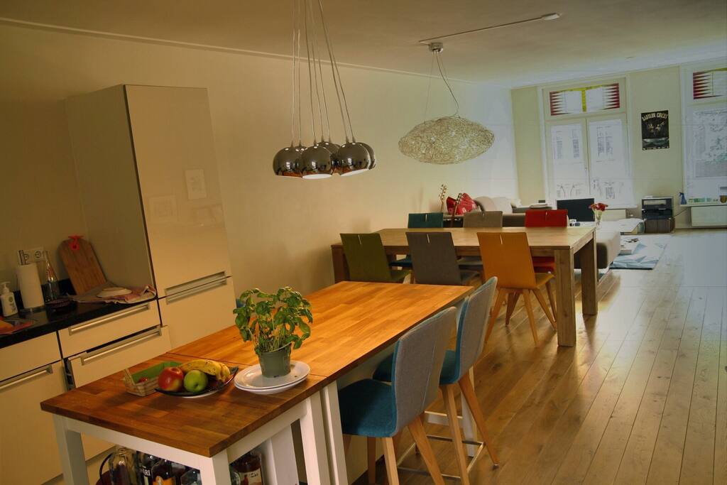 Open space with kitchen, dining area and living room
