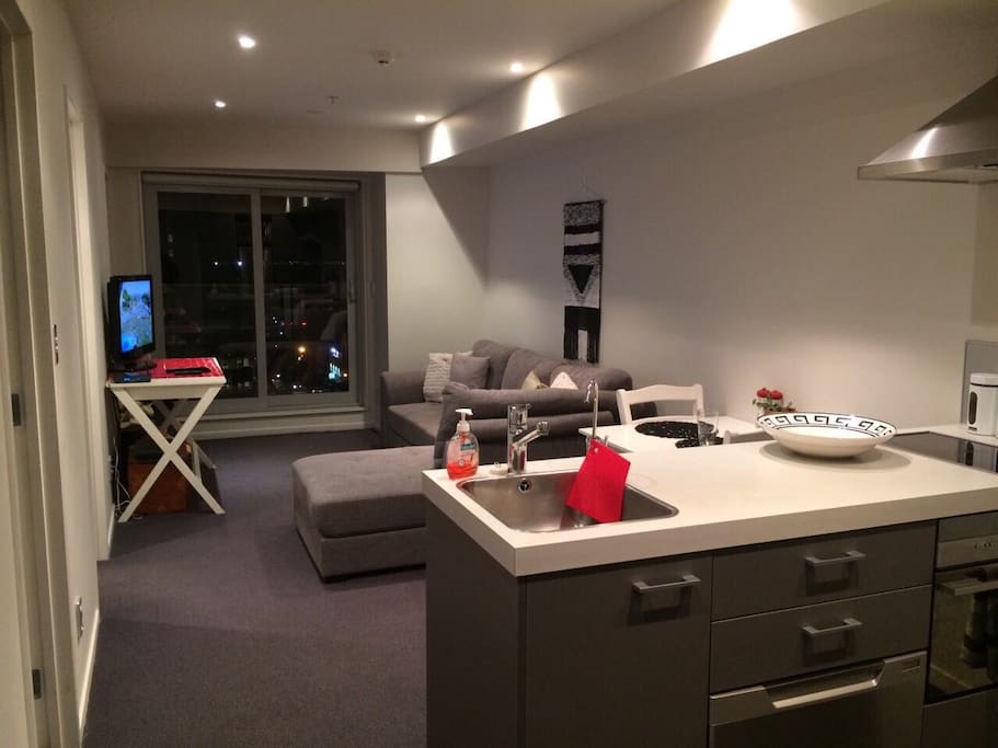 The city lights add a great atmosphere to your living area. The sitting room is superbly appointed with flat screen TV, and DVD player opening onto a sunny balcony with spectacular views.