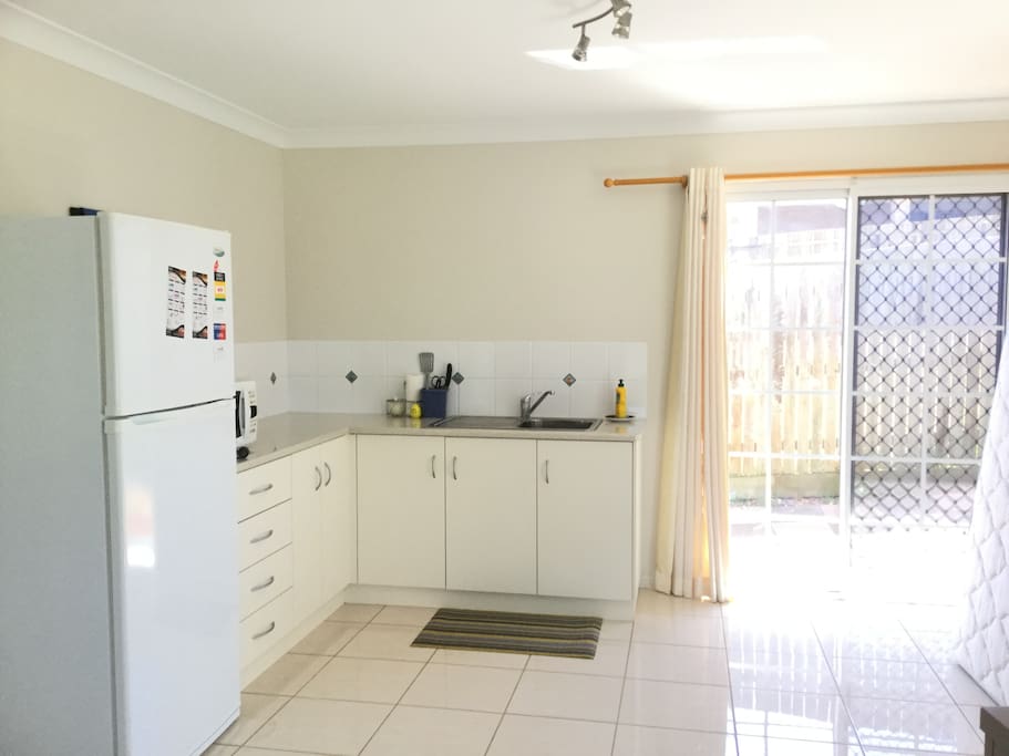 Kitchenette - microwave, fridge and sink. Cutlery is also available.