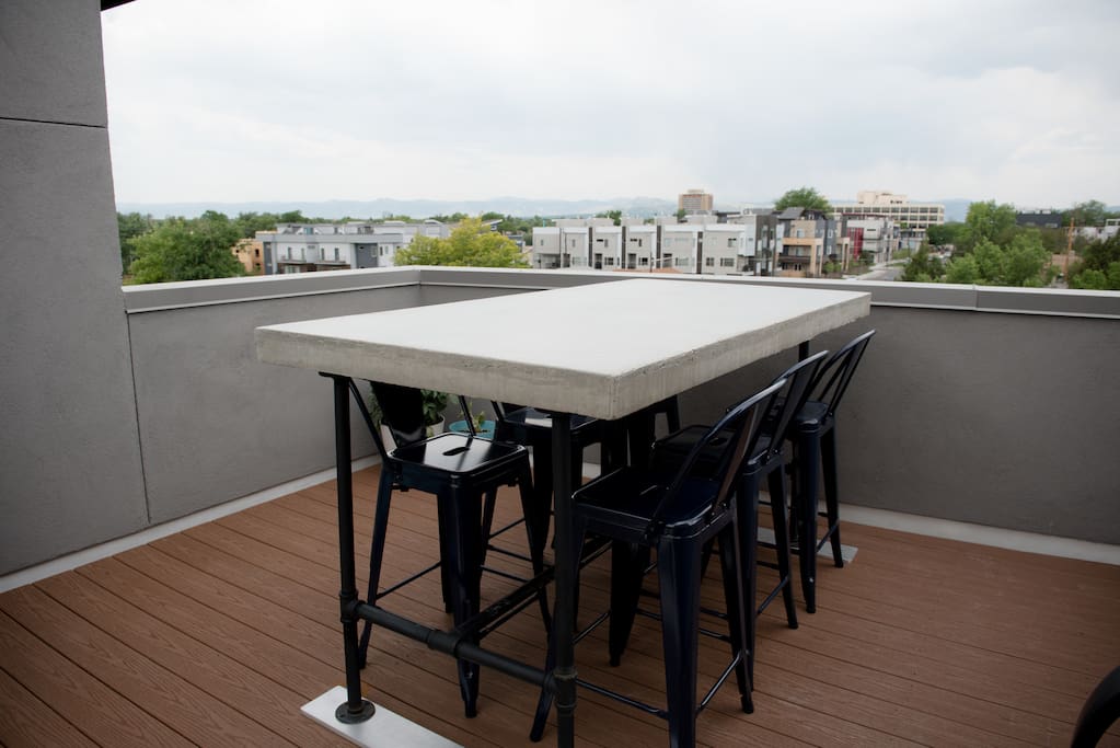 Enjoy dinner on our roof deck with views of the mountains and downtown Denver