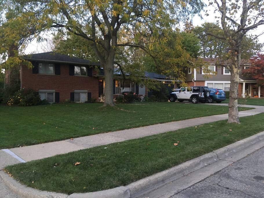 Front of our home. Solar panels, street parking. Driveway parking on game weekends.