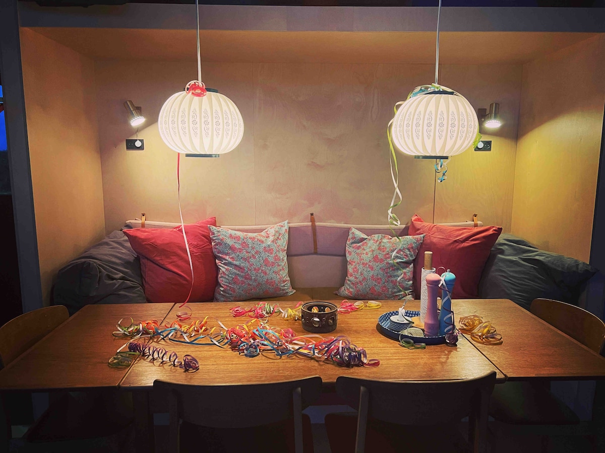 Throw yourself in the alcove. It overlooks the fjord from there. 