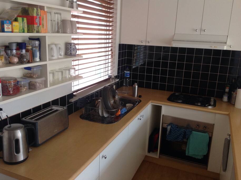 Fully equipped kitchen for use, with excellent pots, pans, and knives