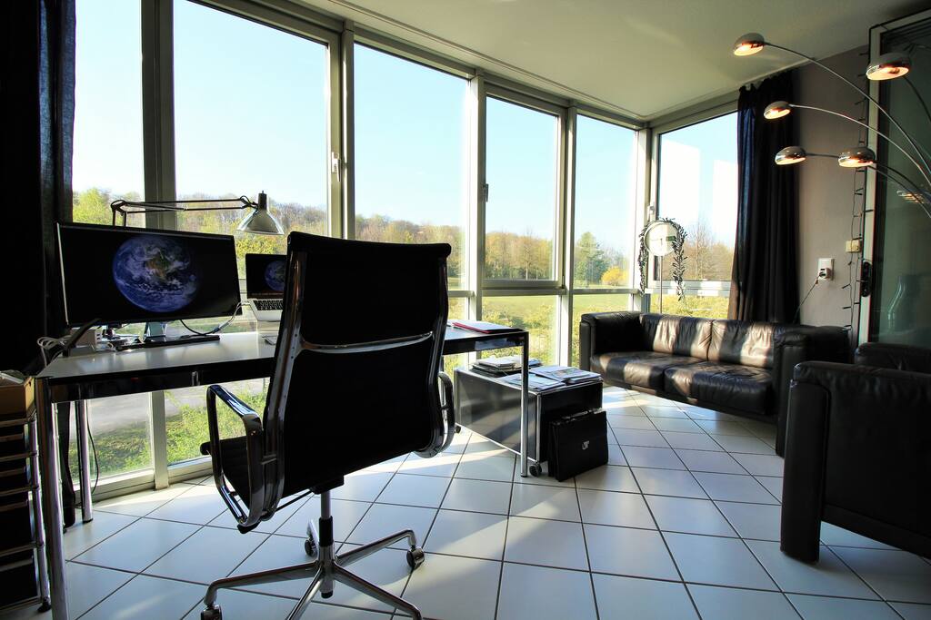 Right by the big window front you have a cozy couch where you can spend a quiet moment.