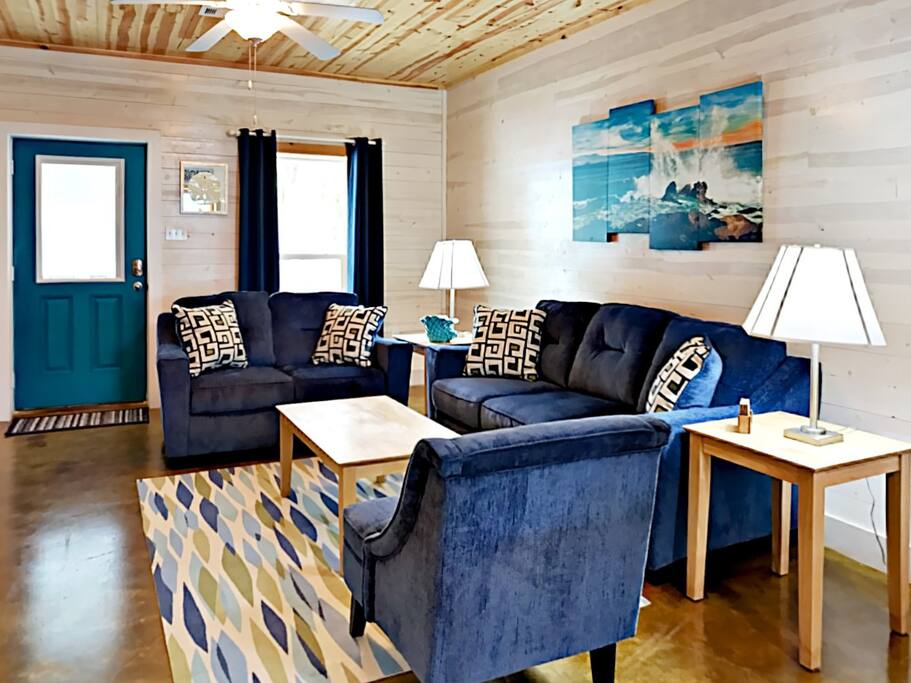 The living room serves as the social heart of this 2-story home. Complimentary Wi-Fi is provided.