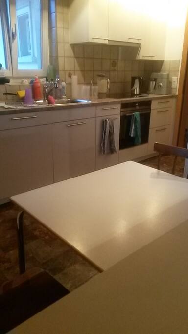 shared kitchen with oven and microwave
