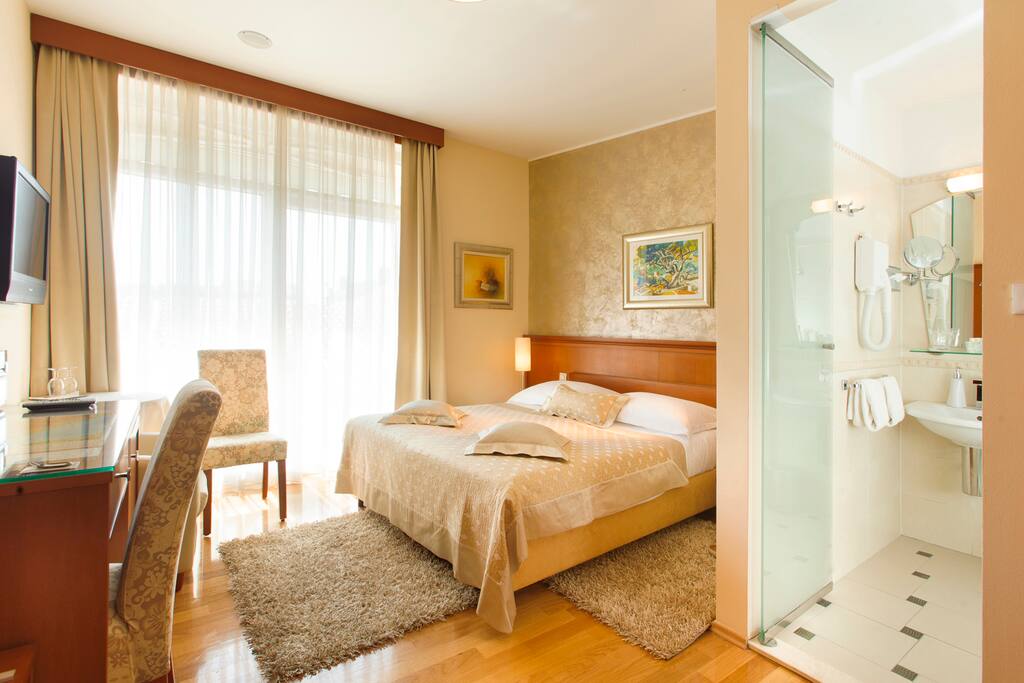 The room is spacious and bright