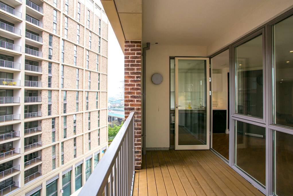 The balcony has wooden decking!