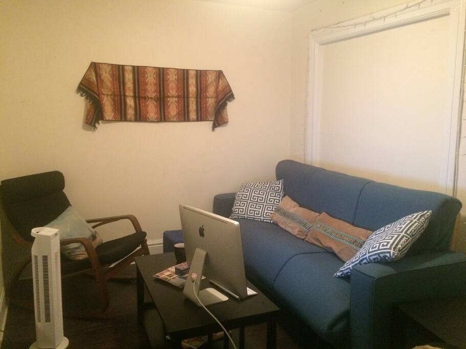 Our living room — complete with rocking chair and Netflix machine.