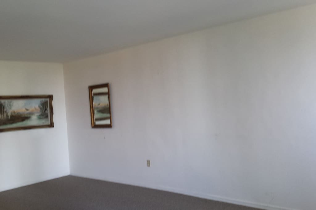 Has sofa, chairs and piano (not shown).
