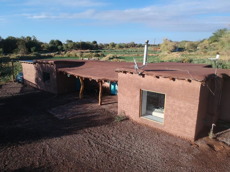 Aerial view of the house and the terrain / Vista aerea de la casa, quincho y el terreno.
