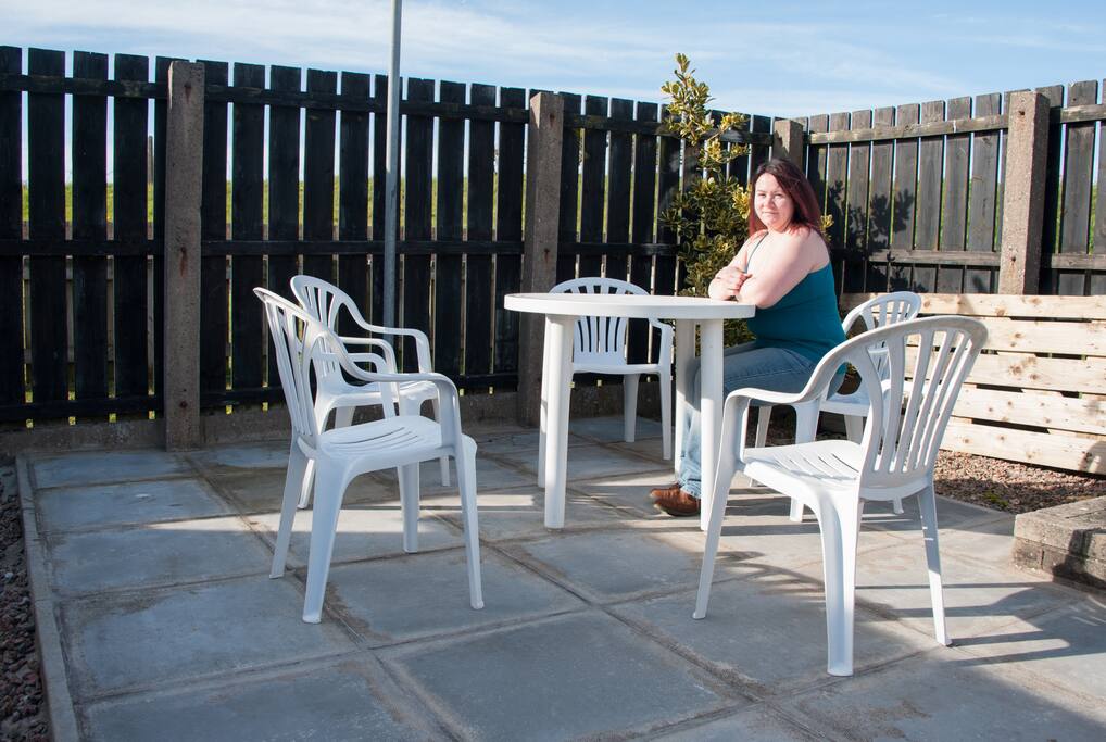 The rear patio and secluded seating area