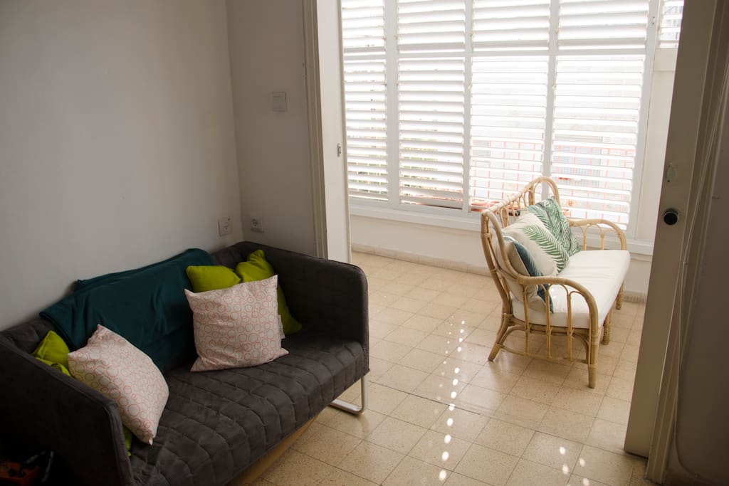 The living room opens up to the balcony.