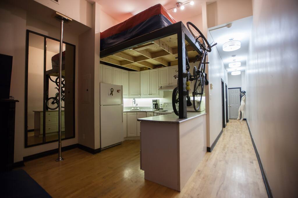 Kitchen loft, stripper pole & hallway