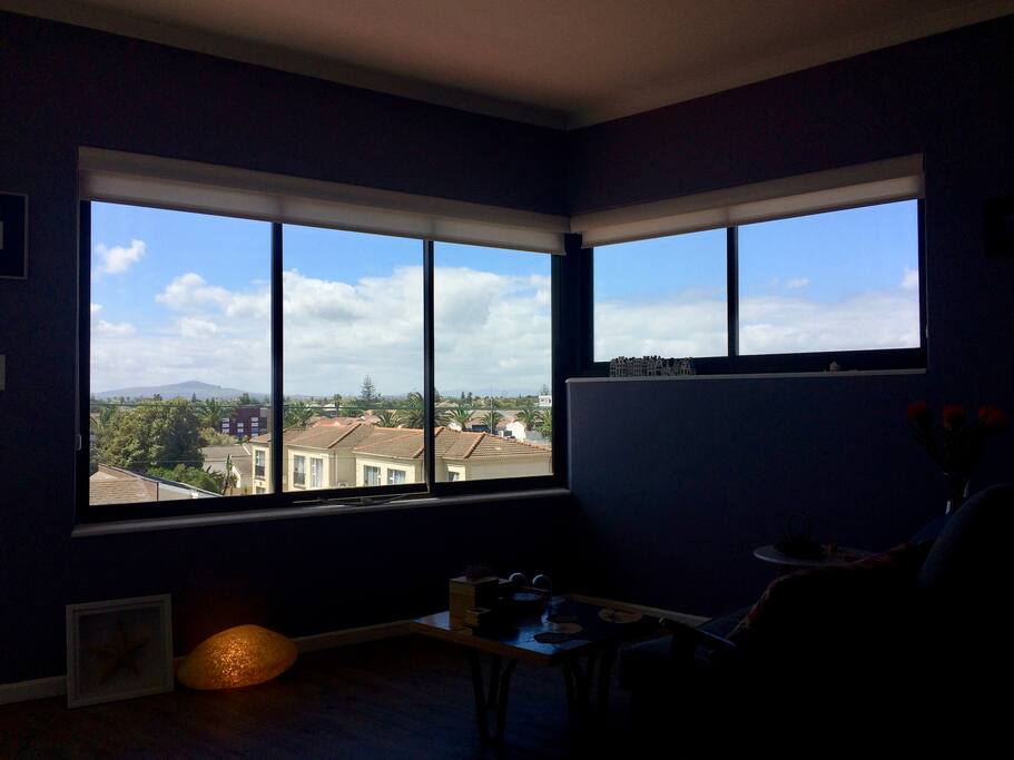Corner window with expansive view of surrounding area.