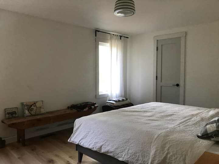 Master bedroom with king bed. 