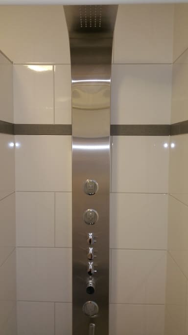 Luxurious design shower with waterfall and massage jets