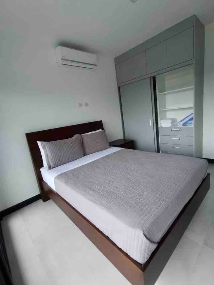 Room with a comfortable bed and air conditioning