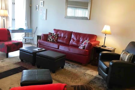 Anne’s Red Couch Condo-Cute, Convenient, No Steps