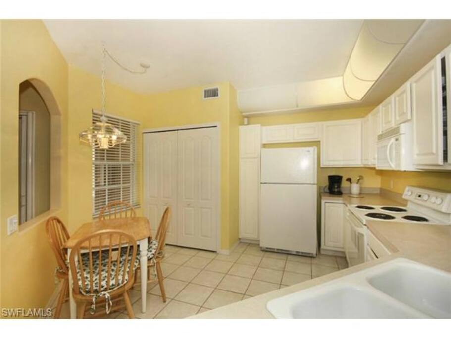 Kitchen + washer/dryer closet