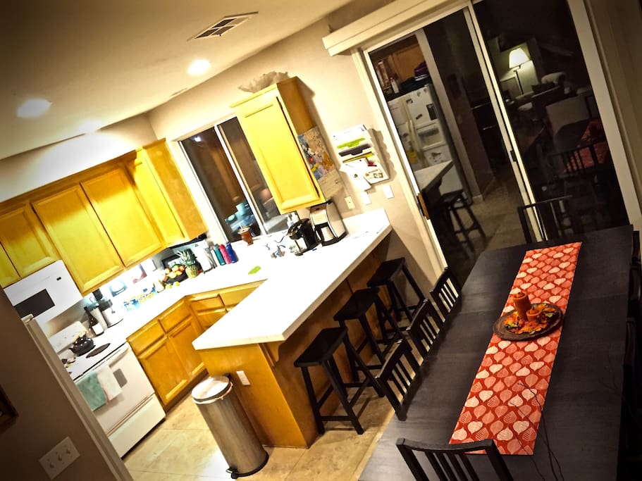 Full kitchen, table for 8, backyard with grill...