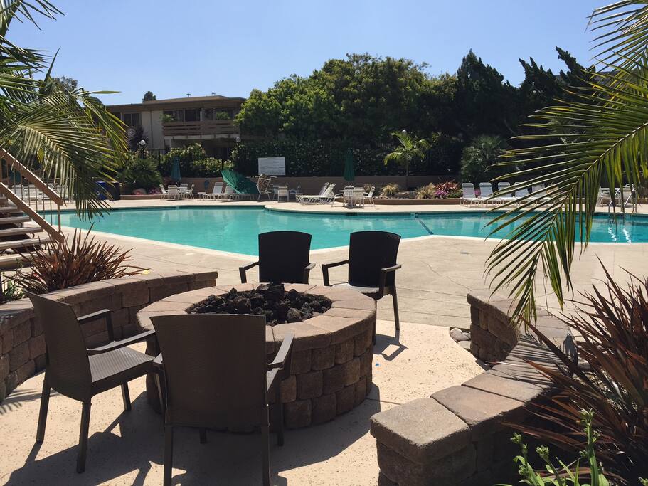 Outdoor fireplace and pool area