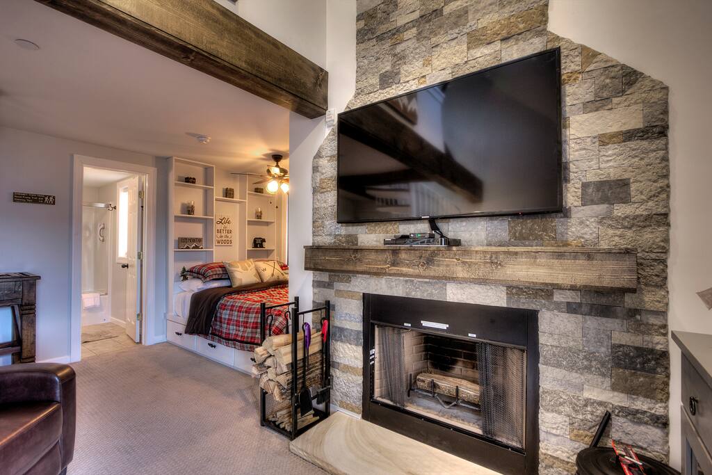 55" TV over custom Stone Fireplace