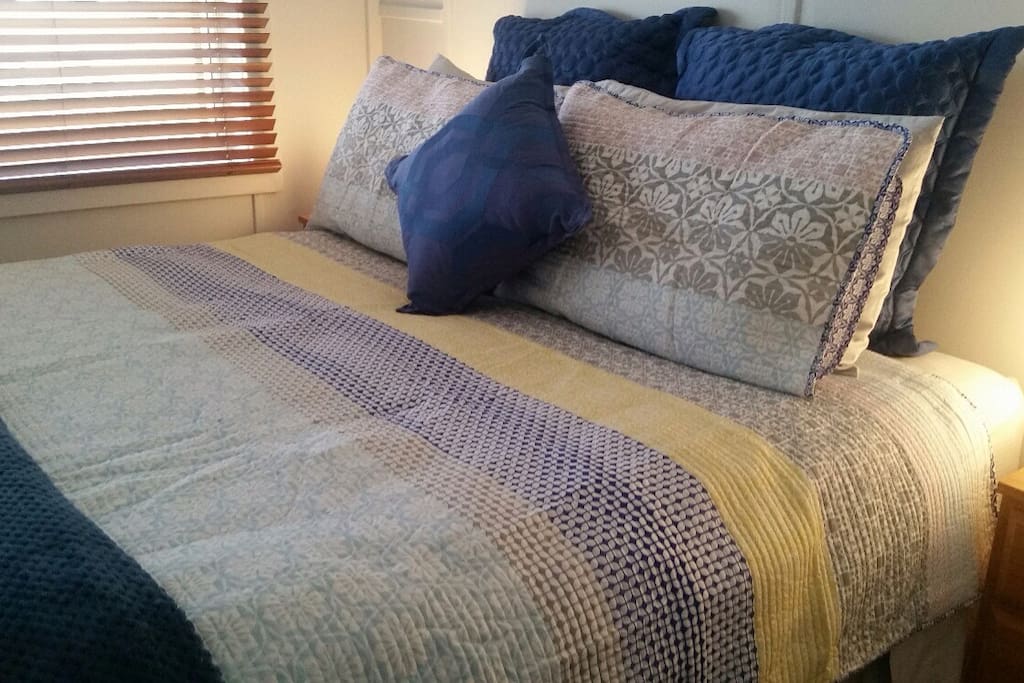 The bedroom has a very comfortable queen bed and is at the front of the house.