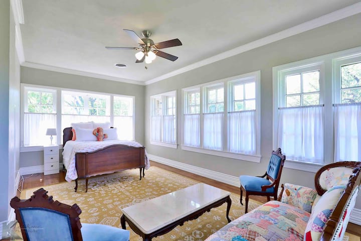 Off of the master bedroom, the South bedroom has panoramic views from one of the tallest points in town