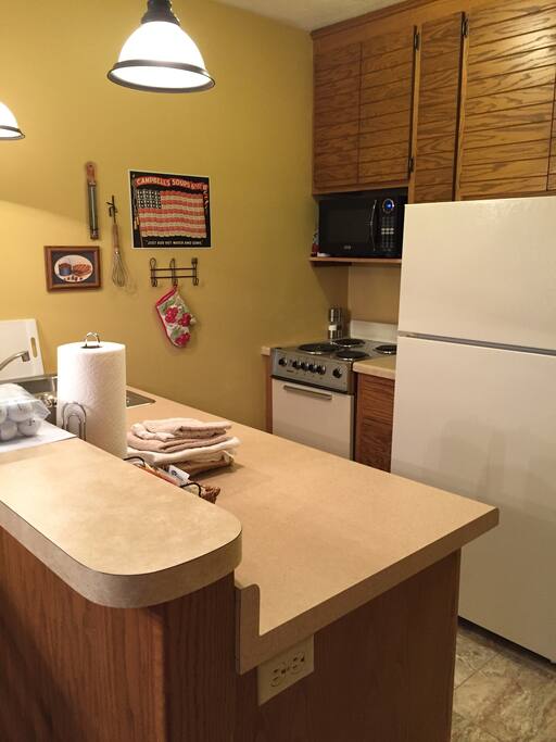 Cook a Meal or prepare a snack in the Kitchen