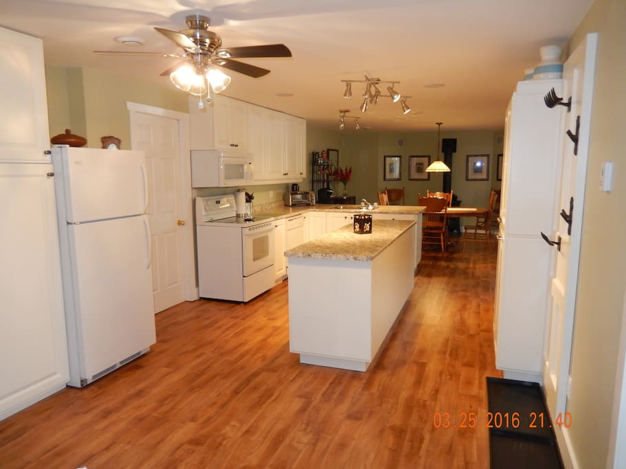 Basement entrance of the fully outfitted spacious kitchen for all your cooking needs.