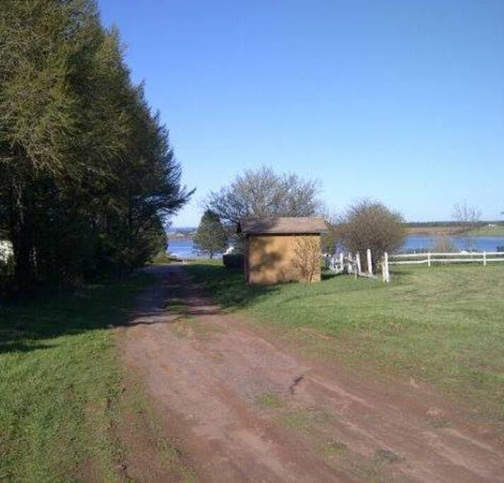 Water View from the front and from every room in the house! The front gets the warm sun all day long.