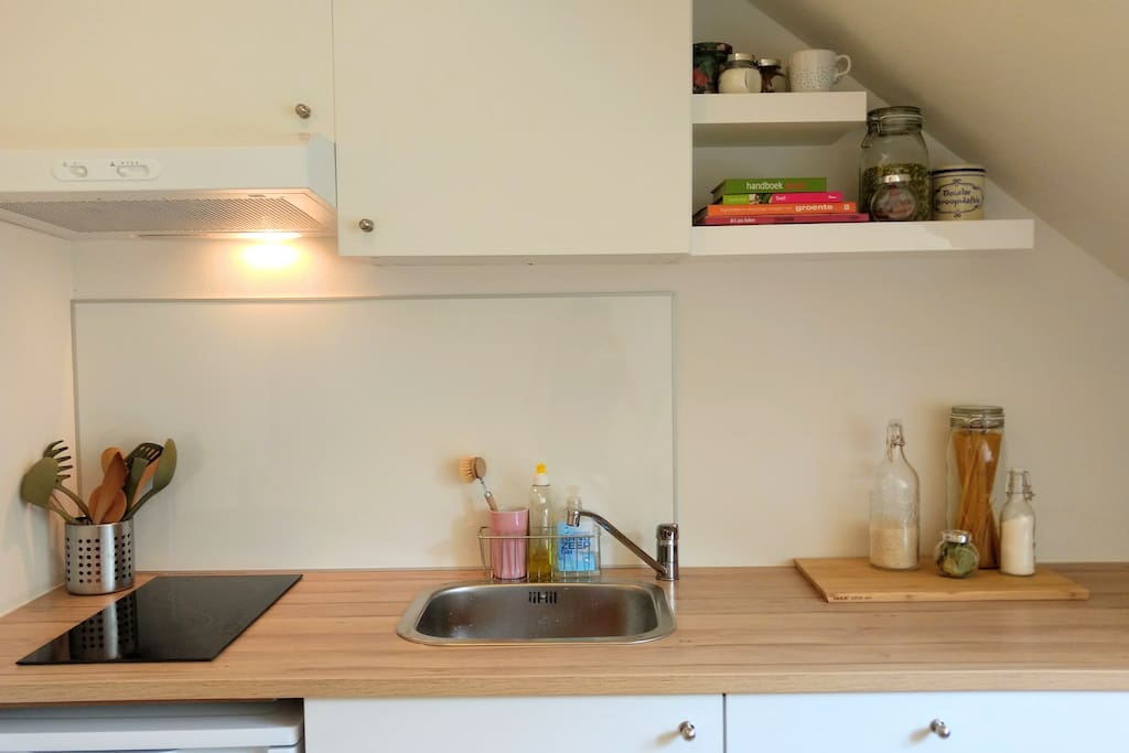 You are free to cook your own meals in the guest kitchen (shared with one other guest room)