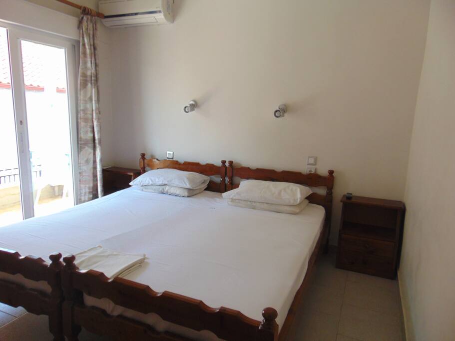 bedroom with one double and one single bed
