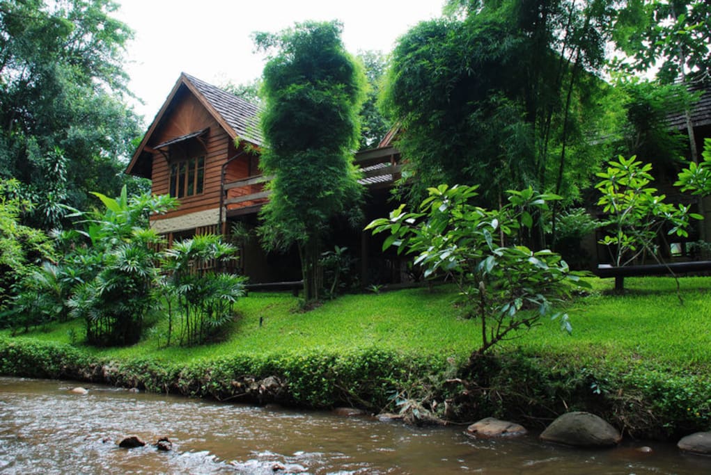 the villa is located along Tachang River