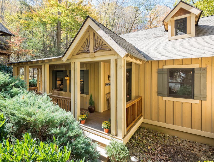 Craftsman style cottage in impeccable condition with front porch.