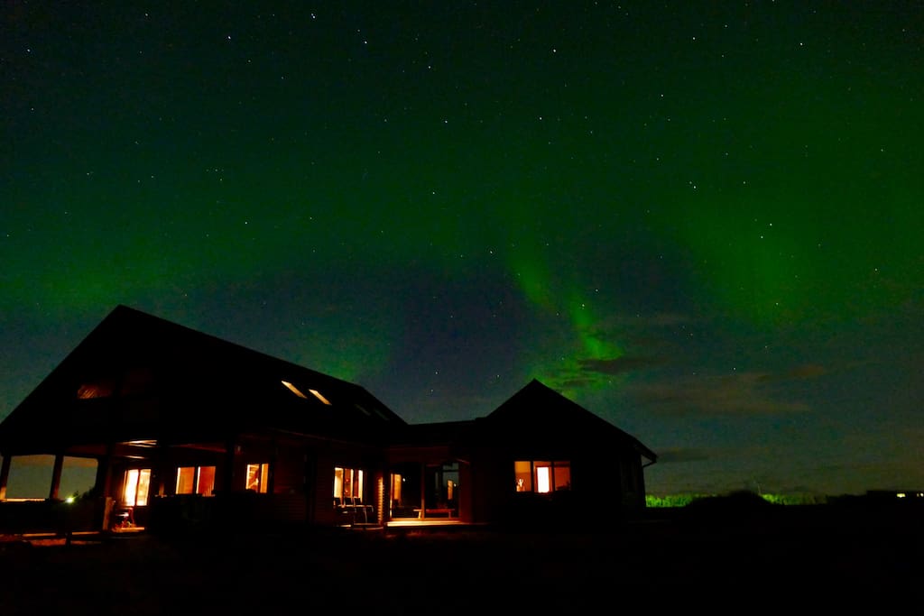 Millhouse Lodge and northern lights