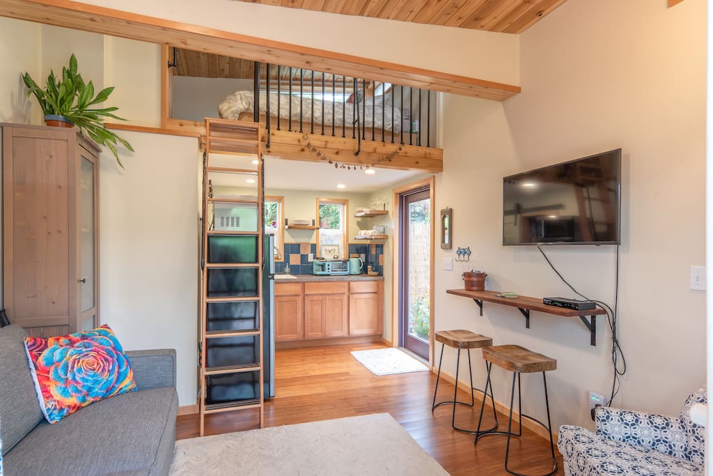 Cozy, comfie queen loft bed up a super secure hand crafted ladder. Cable tv.