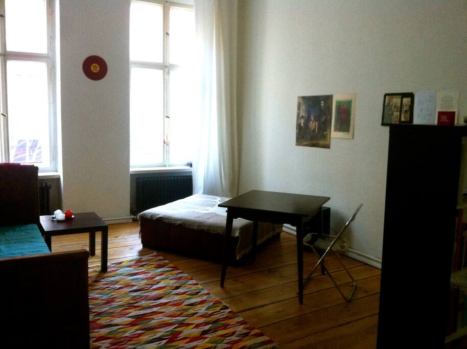 Corner of the living room with the single bed.