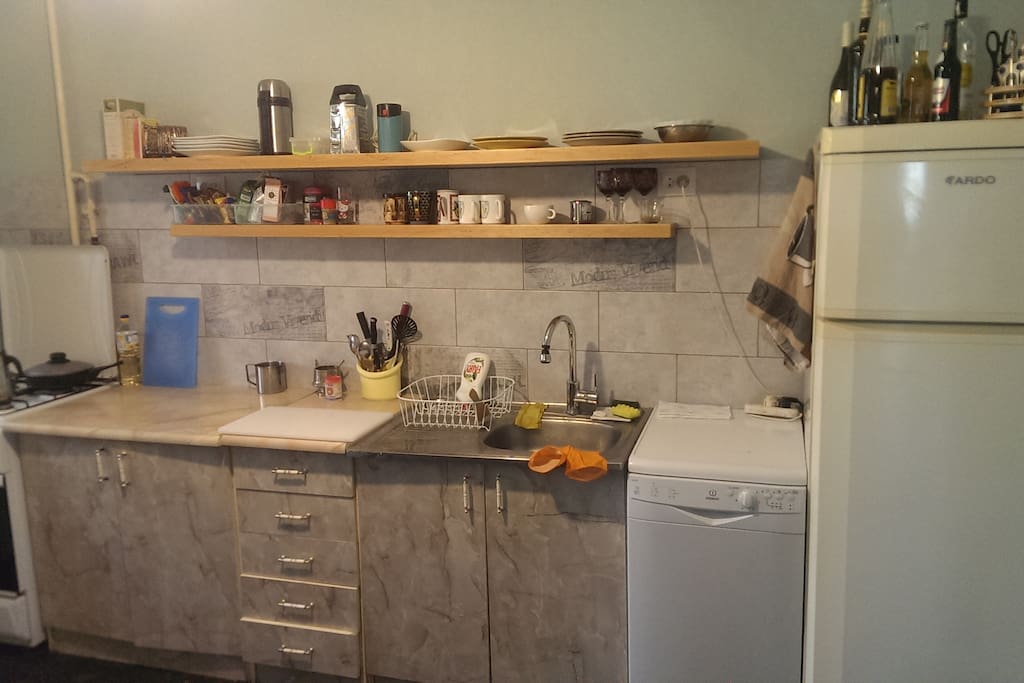 Kitchen has stove, dishwasher, frig and all kitchen stuff.