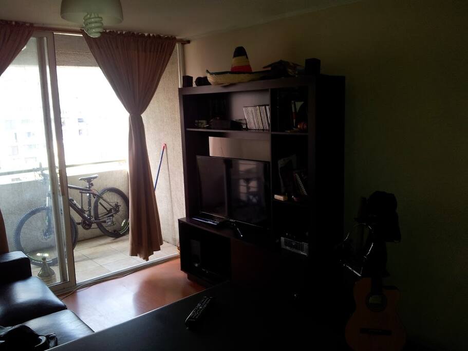 living, balcón