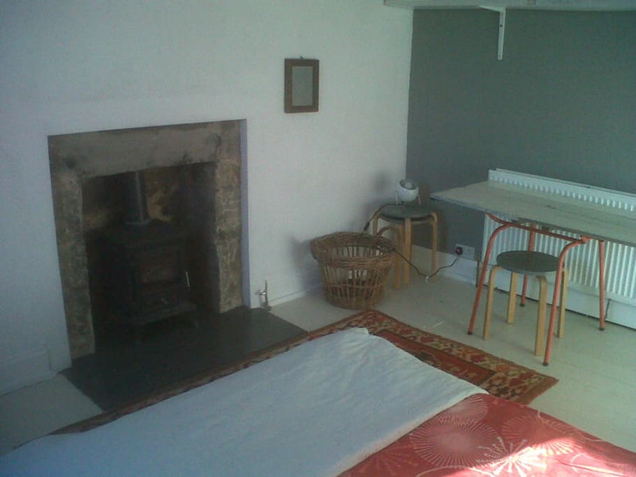 !st floor double guest bedroom with wood stove and central heating