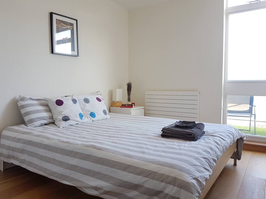 Main bedroom with king-size bed and big build-in wardrobe