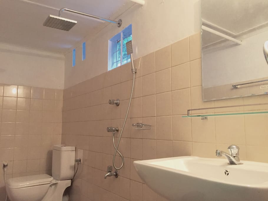 Attached toilet with rain water shower, hand shower.